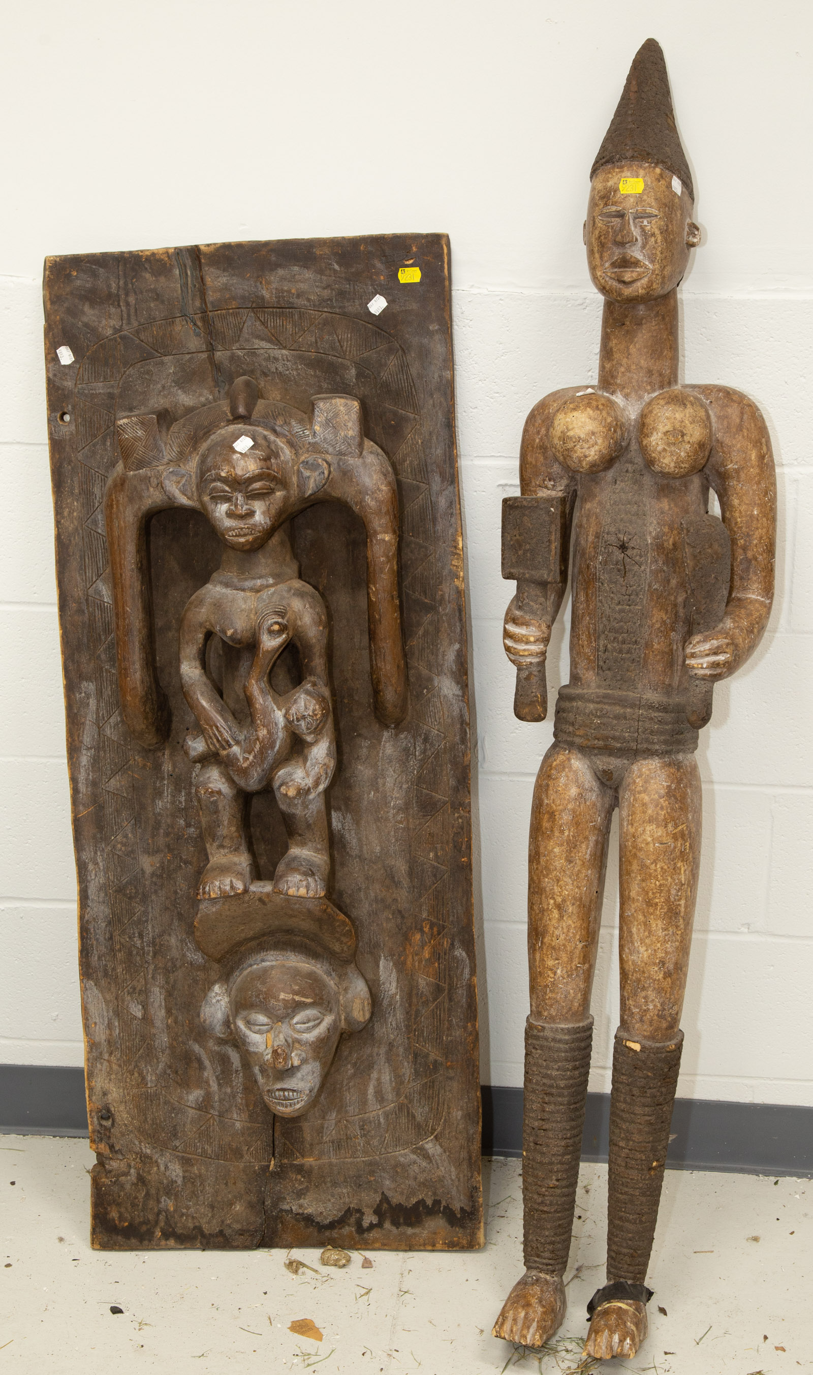 Appraisal: TWO LARGE AFRICAN SCULPTURES th century comprising a Yaka panel