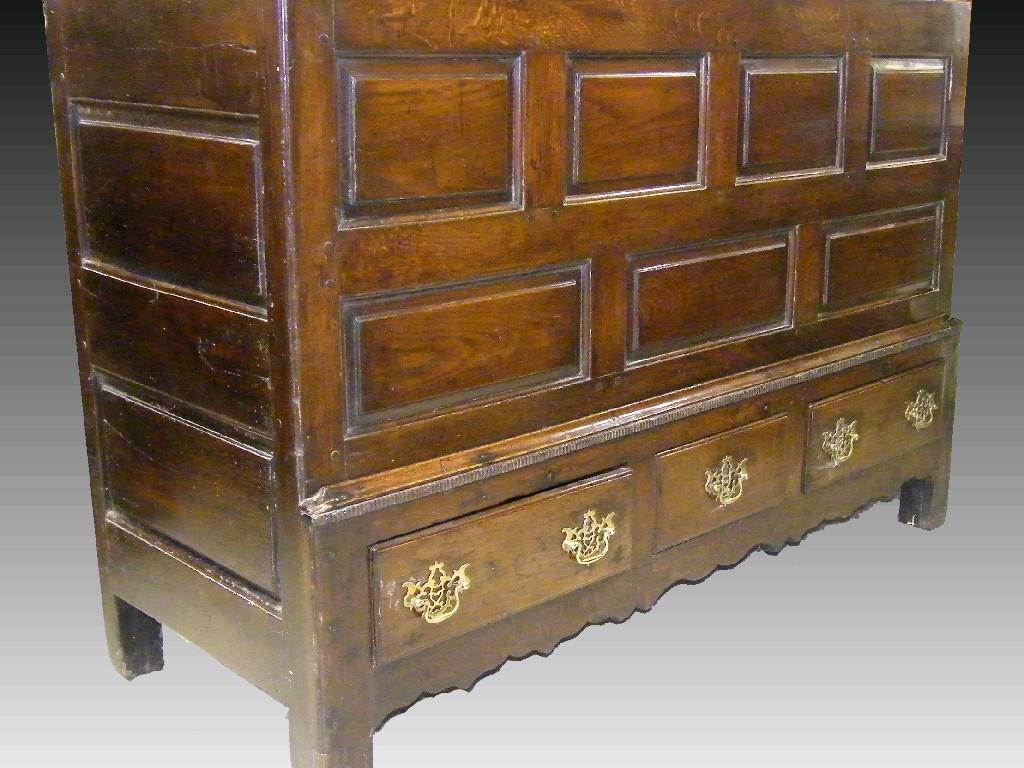 Appraisal: th century oak mule chest the hinged top over a