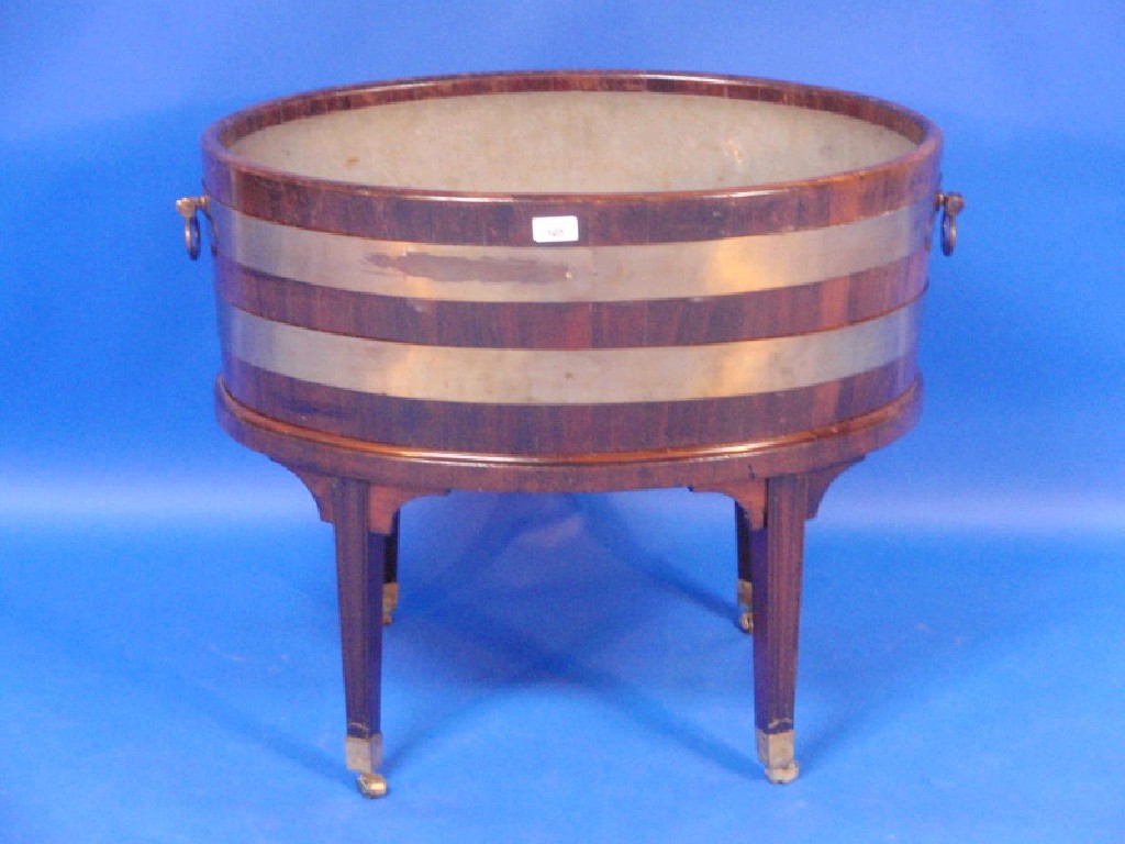 Appraisal: A George III mahogany oval brass bound wine cooler with