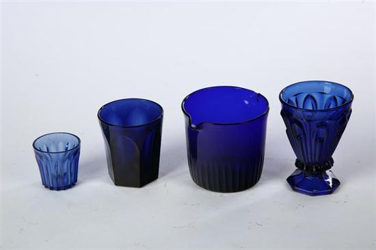 Appraisal: FOUR PIECES OF BLUE GLASS American mid th century Cobalt