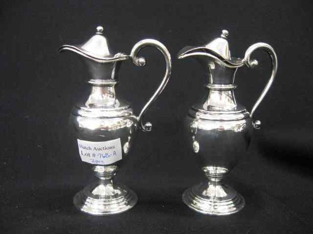 Appraisal: Pair of European Silver Jugs or Pitchers hinged tops hallmarked