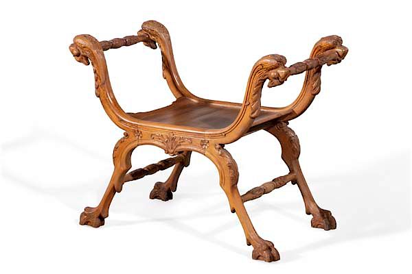 Appraisal: A Continental Baroque style walnut curule stool A Continental Baroque