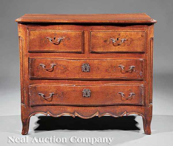 Appraisal: A Louis XV Carved Fruitwood Commode c serpentine top conforming