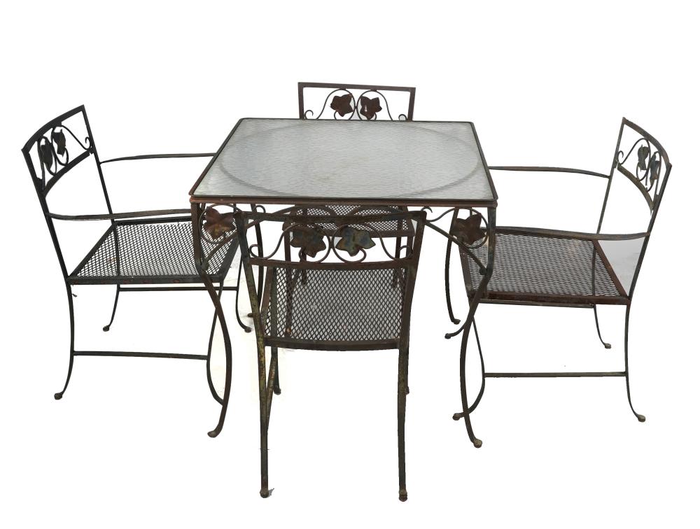 Appraisal: IRON PATIO DINING SETcomprising a table in three parts one