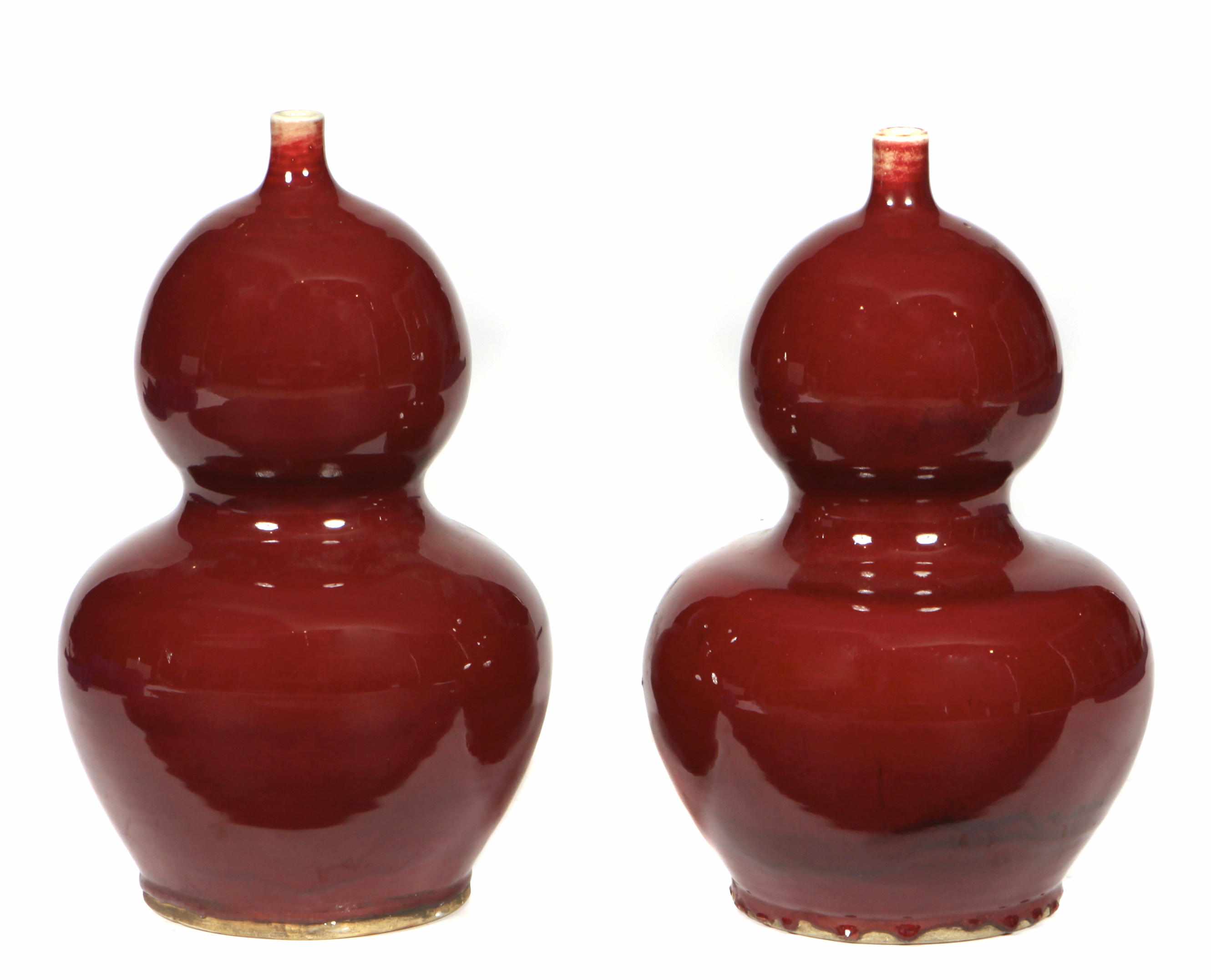 Appraisal: A pair of Chinese oxblood glazed gourd form vases height