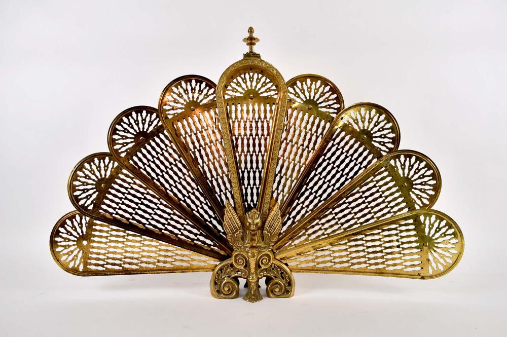 Appraisal: FRENCH BRASS FAN SHAPED FIREPLACE SCREENCirca The pierced collapsible grill