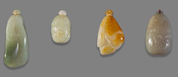 Appraisal: Four jade snuff bottles The first in the shape of