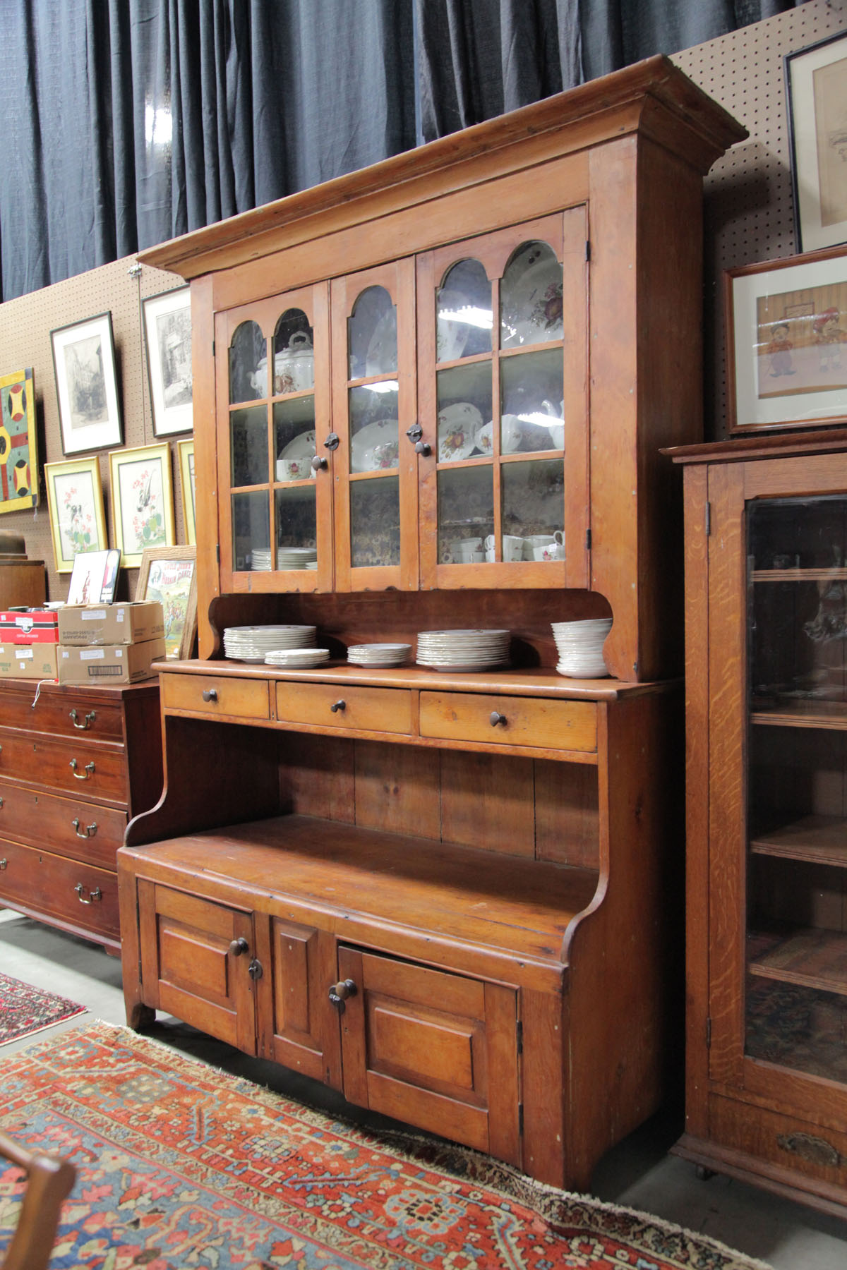 Appraisal: COUNTRY CUPBOARD American late th century Pine cupboard having glazed