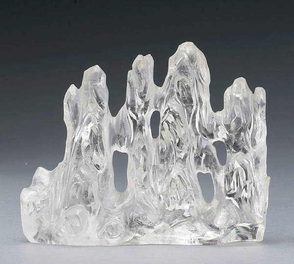 Appraisal: A rock crystal brush rest Late th Century Modeled in