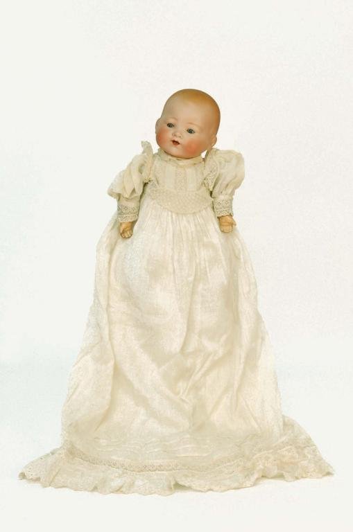 Appraisal: An Armand Marseille baby doll Bisque head Cloth body with