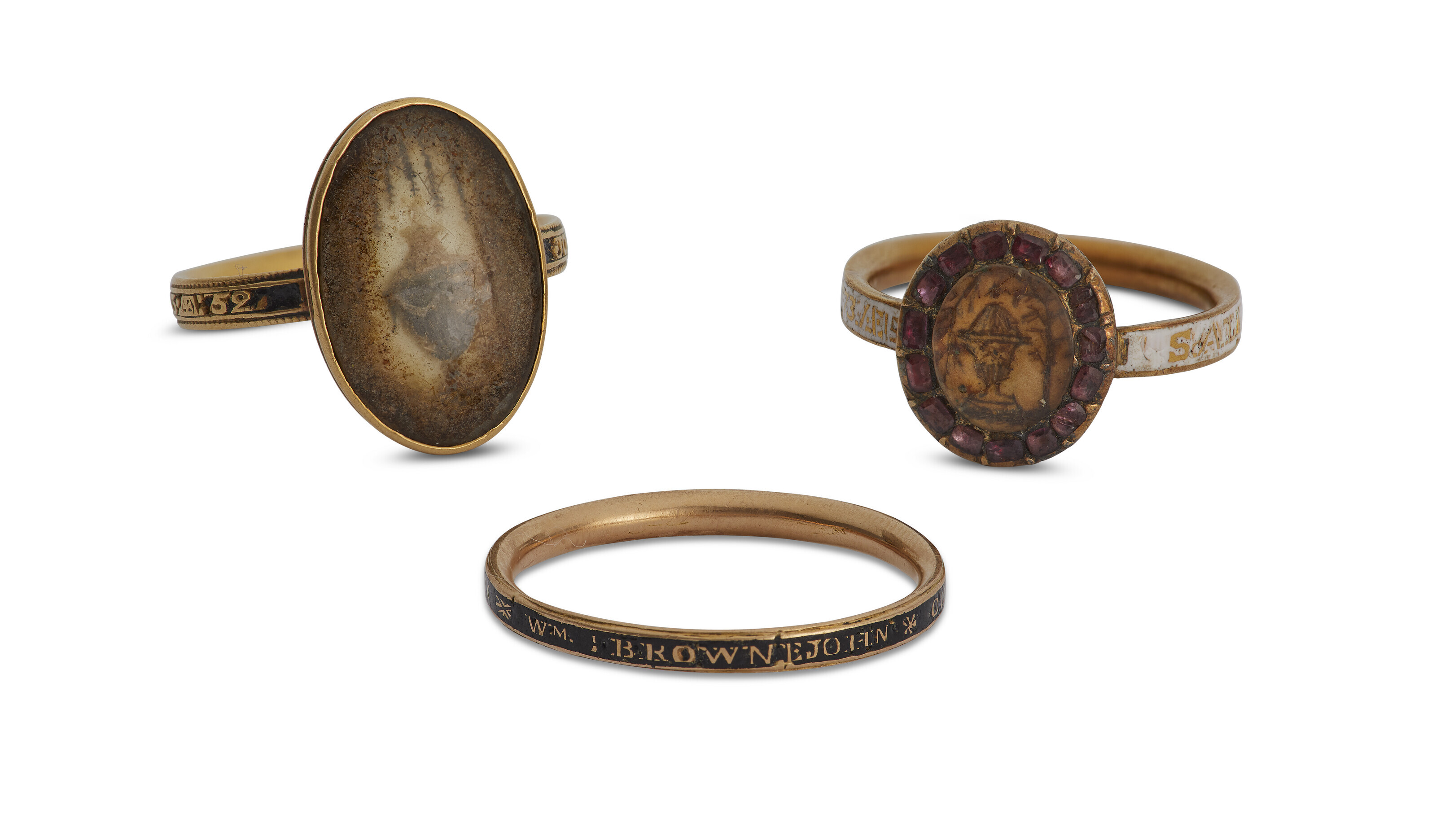 Appraisal: THREE AMERICAN GOLD AND ENAMEL MOURNING RINGS - The first