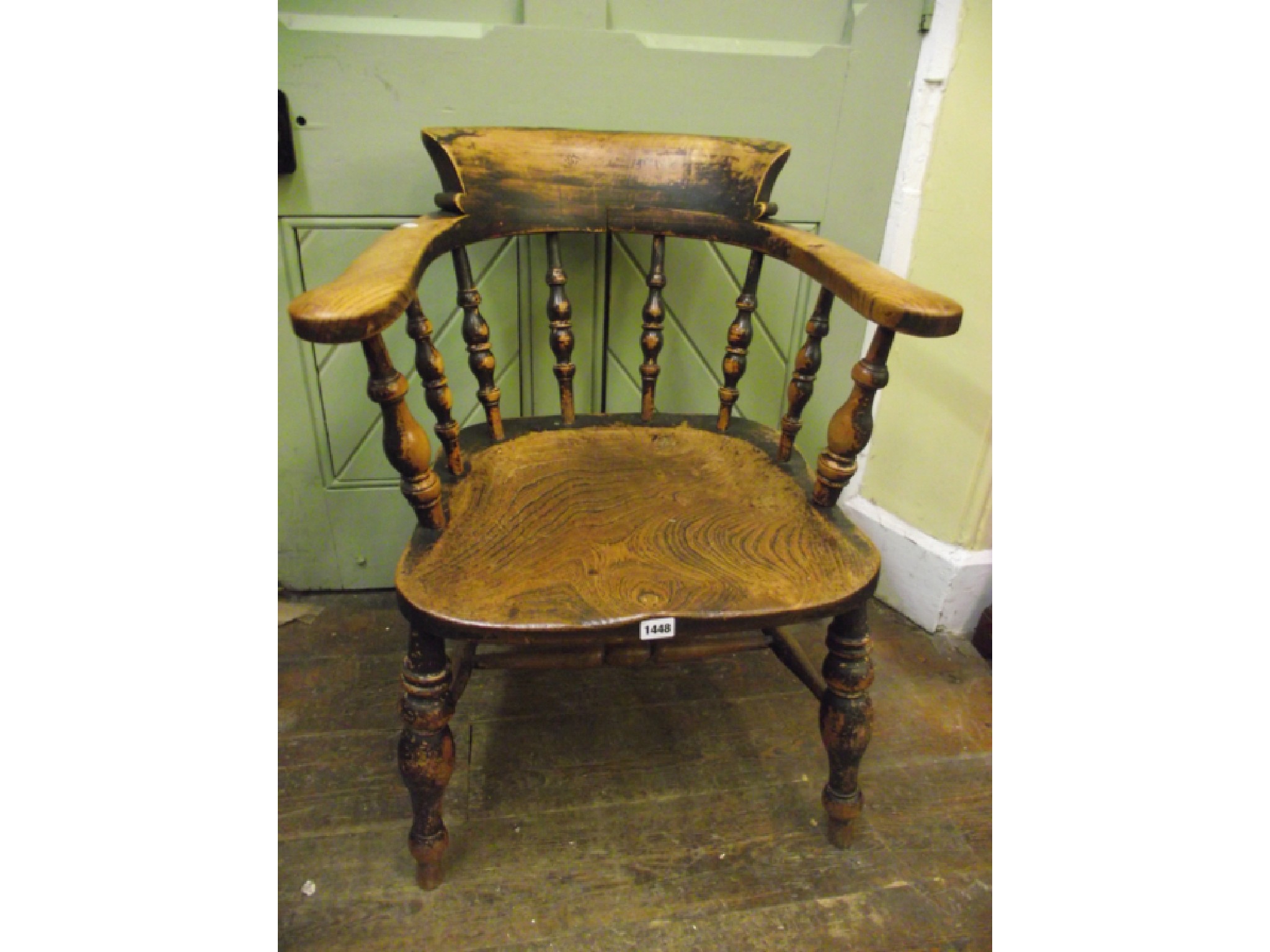 Appraisal: A th century Windsor smokers bow elbow chair principally in