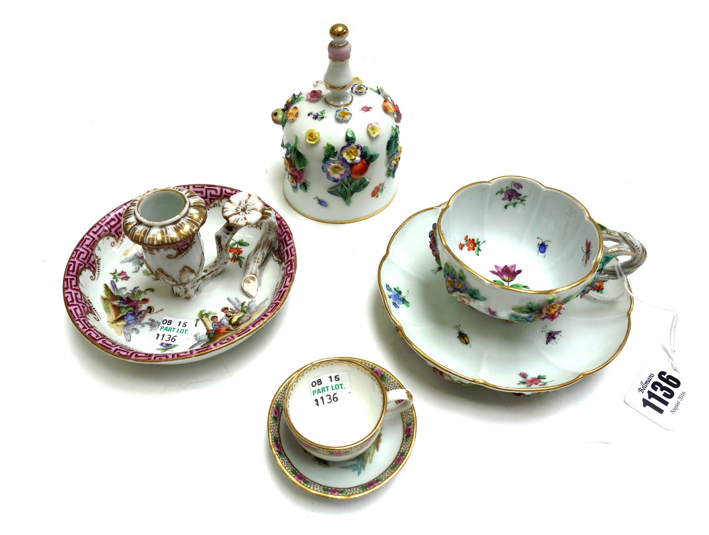 Appraisal: A Meissen floral encrusted tea cup and saucer th century