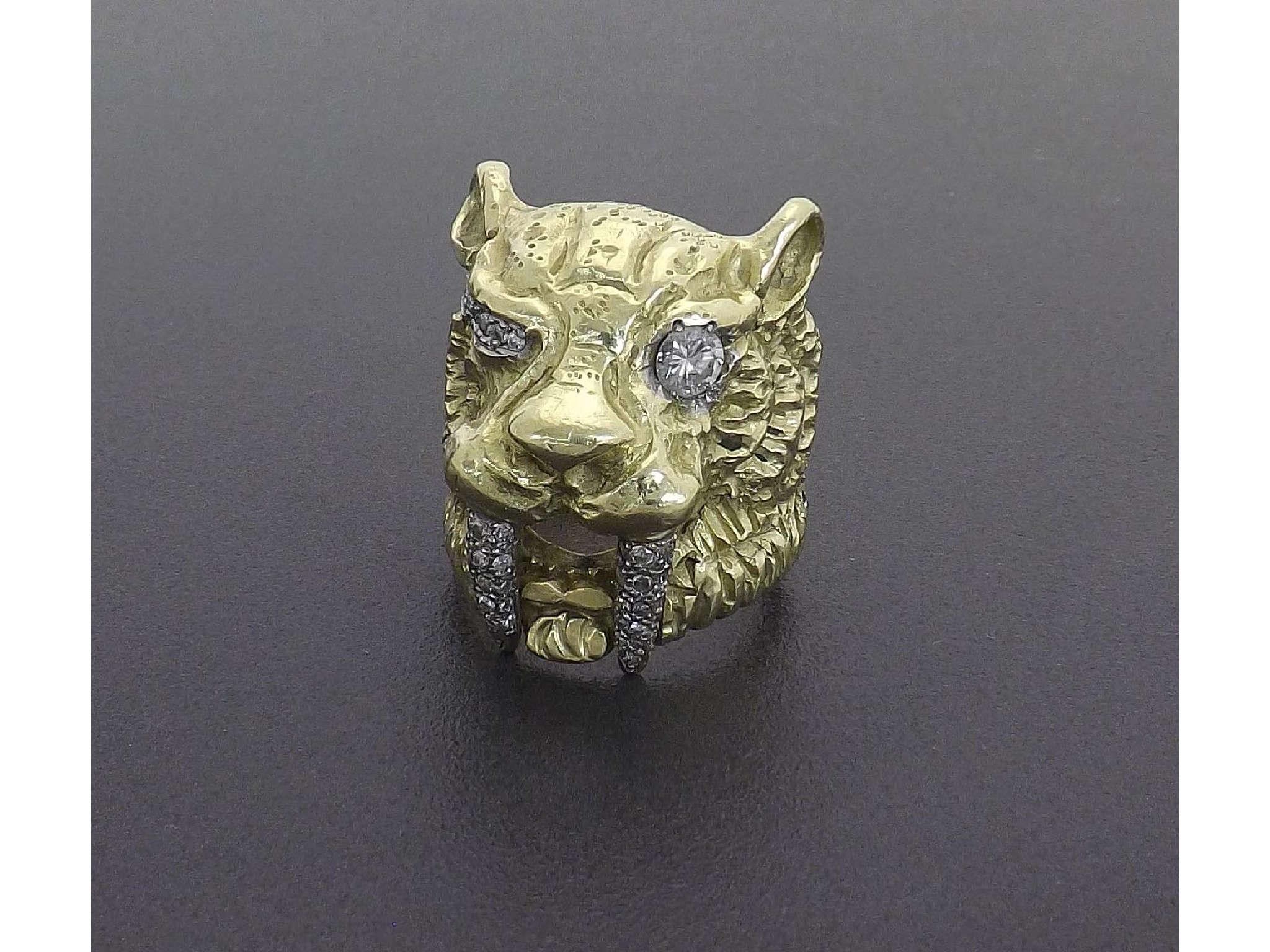 Appraisal: Impressive gold diamond set sabre tooth tiger ring gm mm