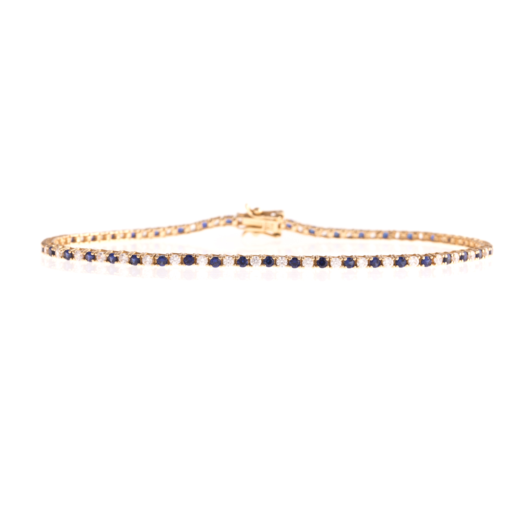 Appraisal: A Lady's Tennis Bracelet in K K yellow gold bracelet