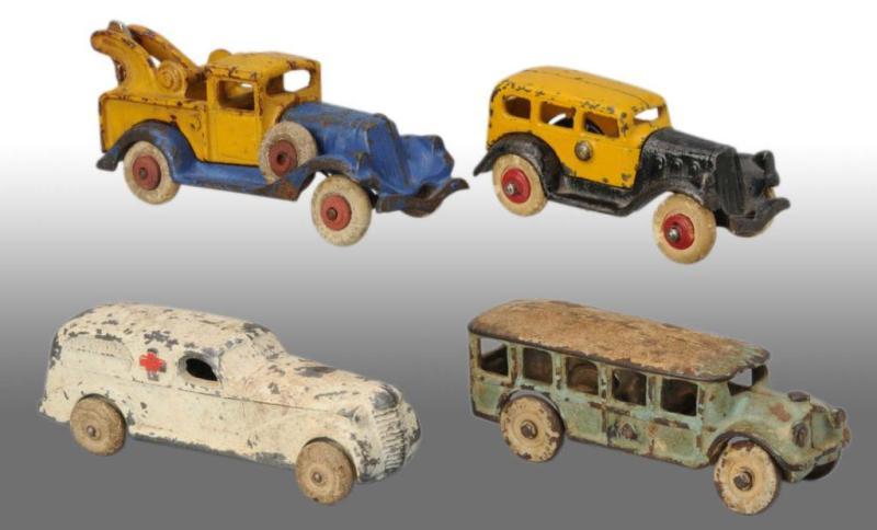 Appraisal: Lot of Cast Iron Slush Mold Vehicle Toys Description Includes