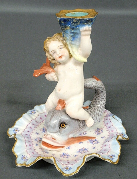 Appraisal: - Colorful th c Continental porcelain candleholder in the form