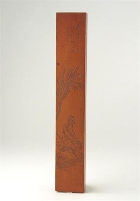 Appraisal: A Chinese boxwood scroll weight carved with a watery landscape