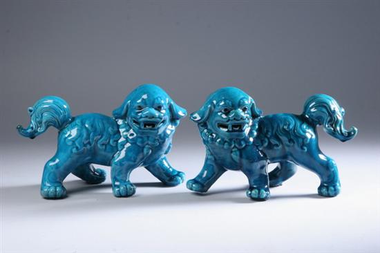 Appraisal: PAIR CHINESE TURQUOISE PORCELAIN FIGURES OF FU DOGS - in