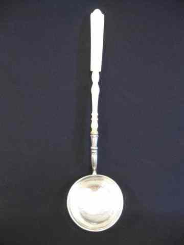 Appraisal: European Silver Ivory Soup Ladle th century '' long unmarked