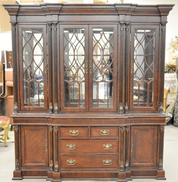 Appraisal: Mahogany breakfront with mirror back and glass shelves ht in