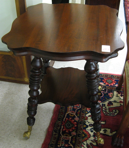 Appraisal: VICTORIAN STYLE MAHOGANY LAMP TABLE American th century having a