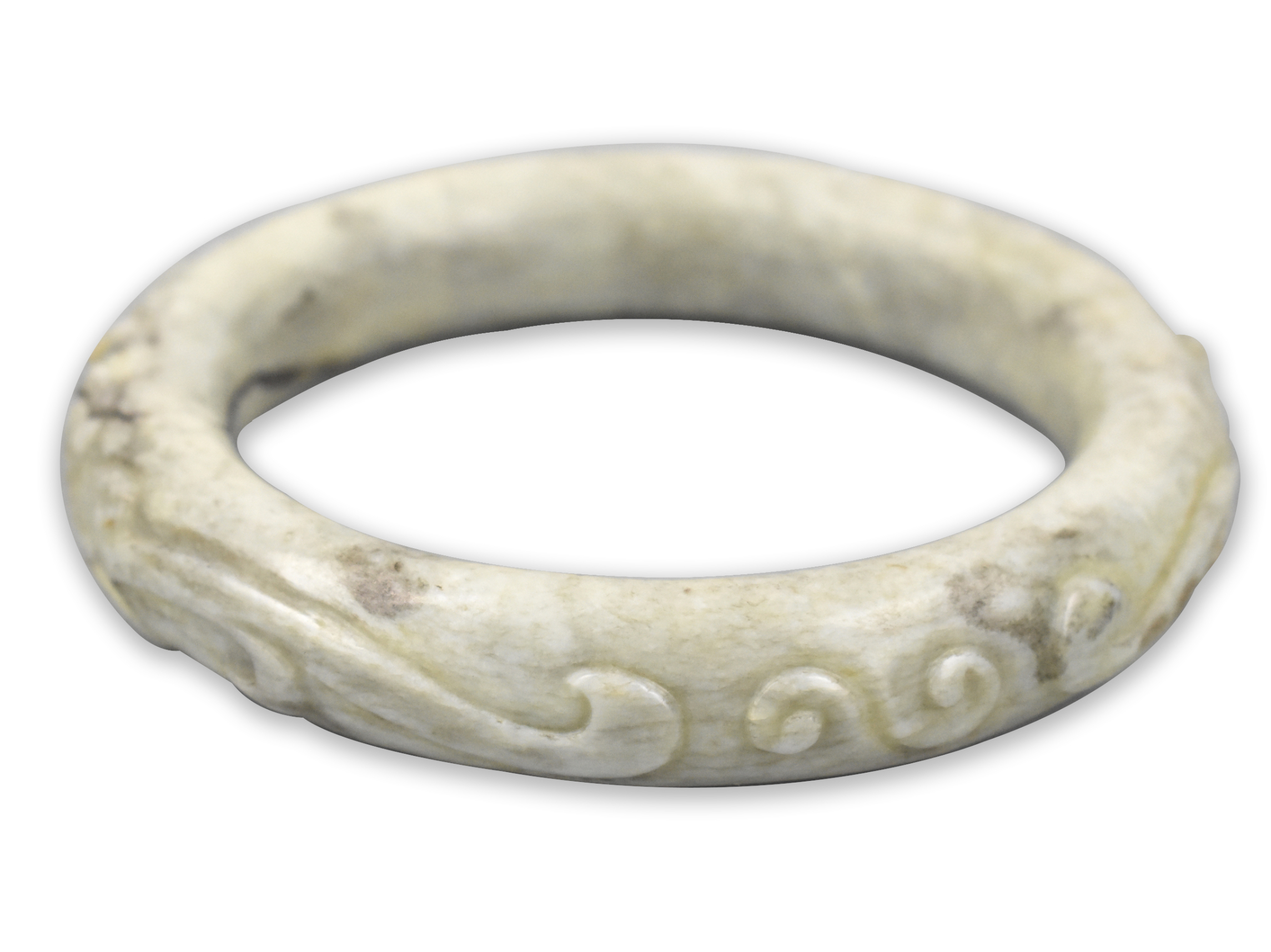 Appraisal: A Chinese jade dragon bangle dating from the Ming dynasty