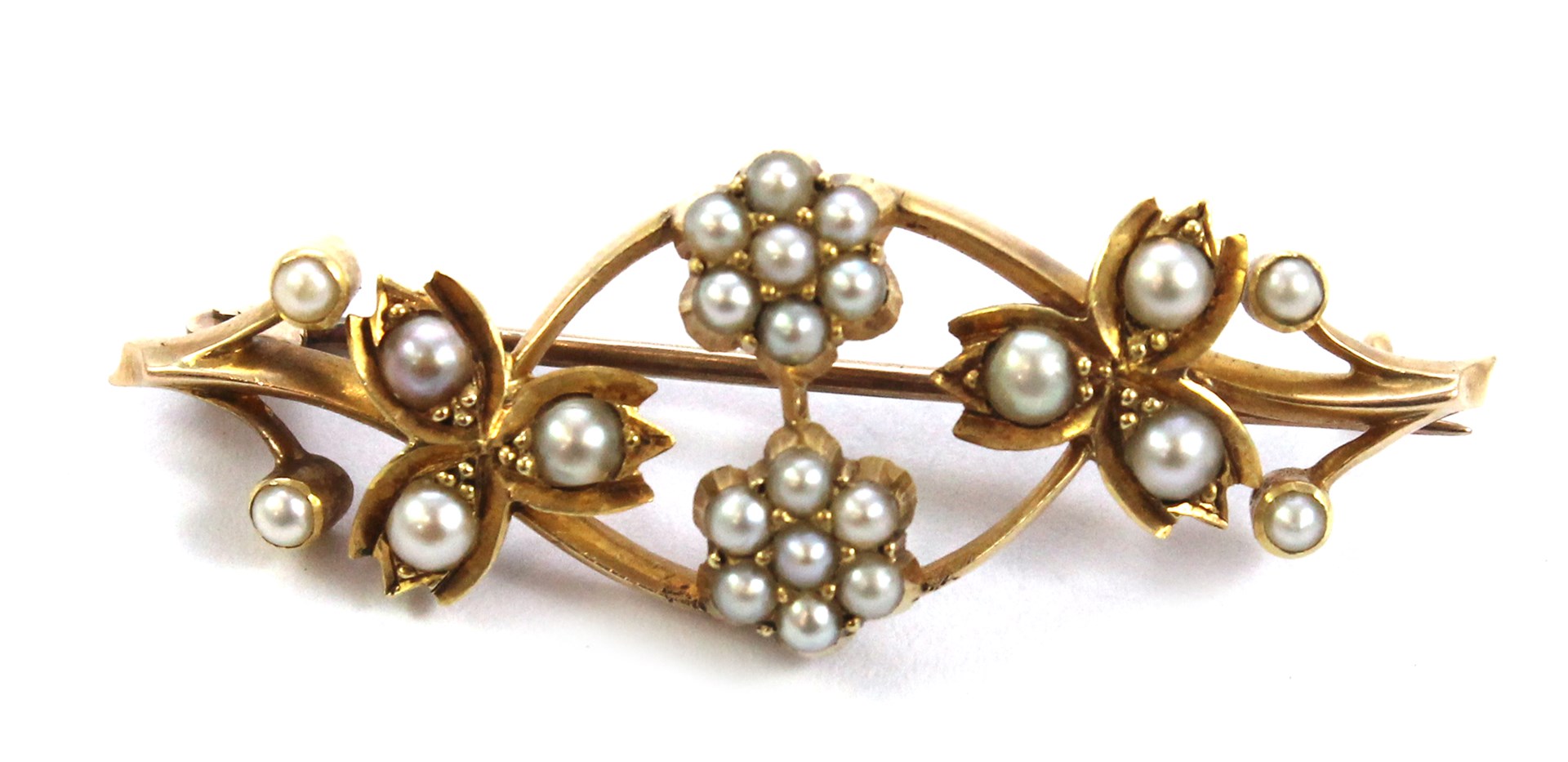 Appraisal: A gold and seed pearl set brooch designed as a