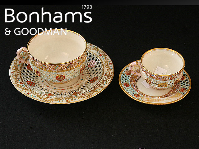 Appraisal: A Royal Worcester cup and saucer with reticulated overlay in