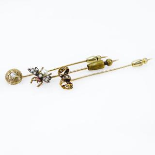 Appraisal: Collection of Three Victorian Karat Yellow Gold Stickpins accented with