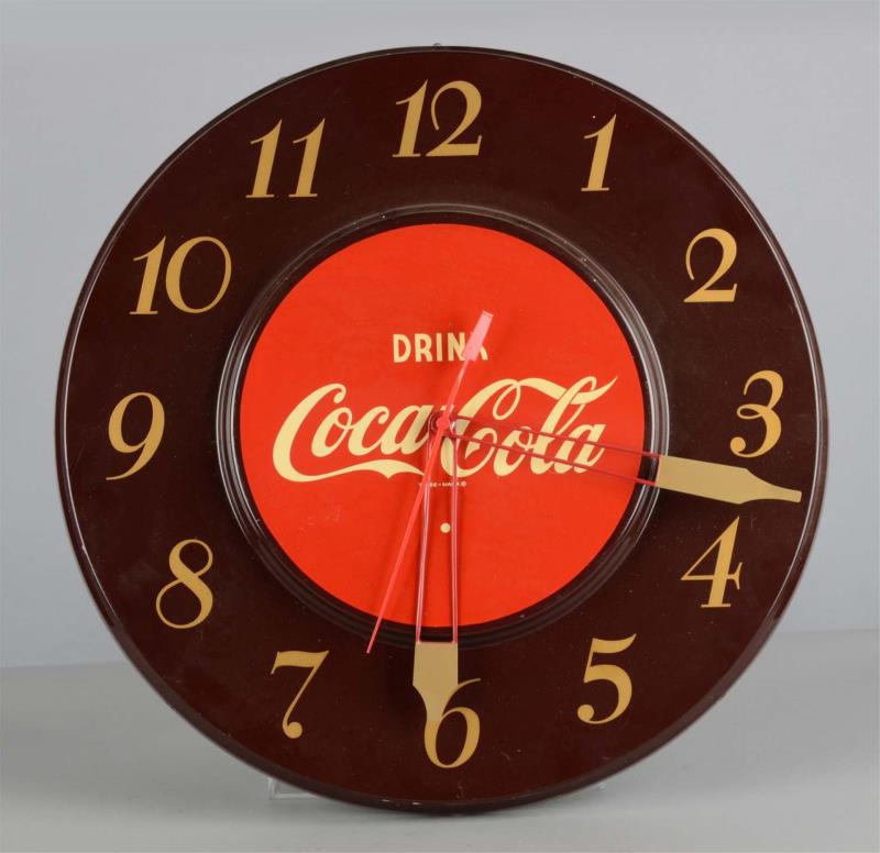 Appraisal: Coca Cola Advertising Clock Tin electric Coca Cola wall clock