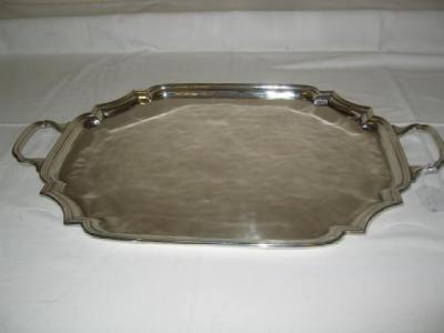 Appraisal: A TEA TRAY of shaped oblong form with loop handles