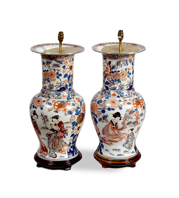 Appraisal: A PAIR OF JAPANESE IMARI LARGE BALUSTER VASES painted in