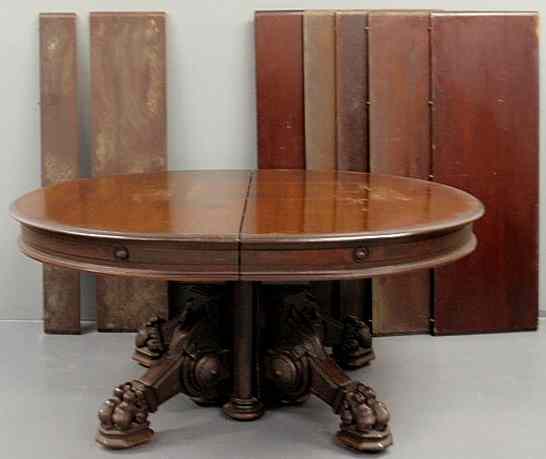 Appraisal: Victorian walnut banquet table c with a heavily carved base