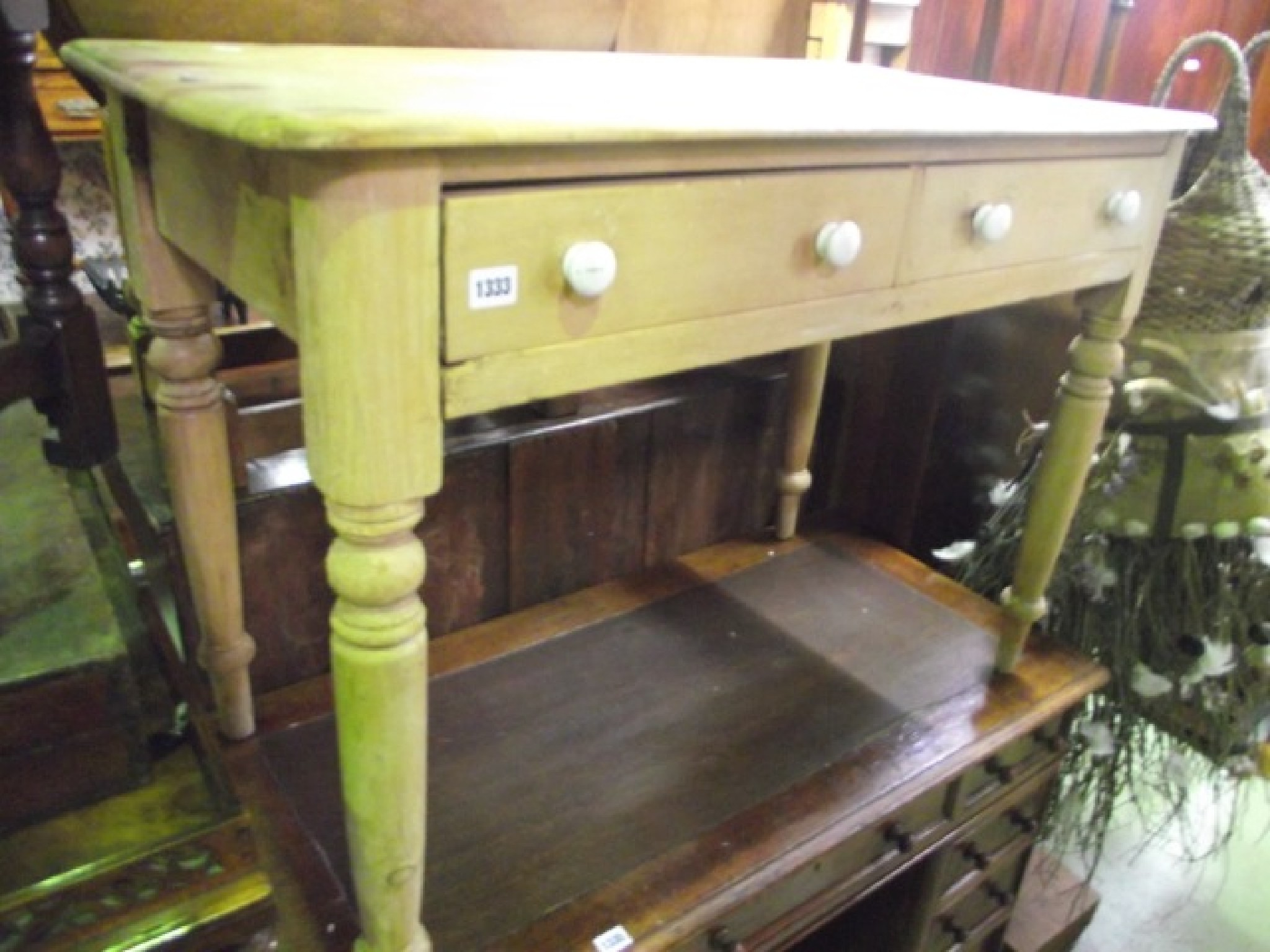 Appraisal: A Victorian stripped pine side table fitted with two frieze