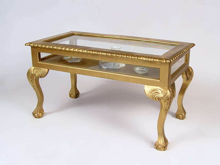 Appraisal: GILT BALL CLAW FOOT TABLE VITRINE DISPLAY Hinged glass top