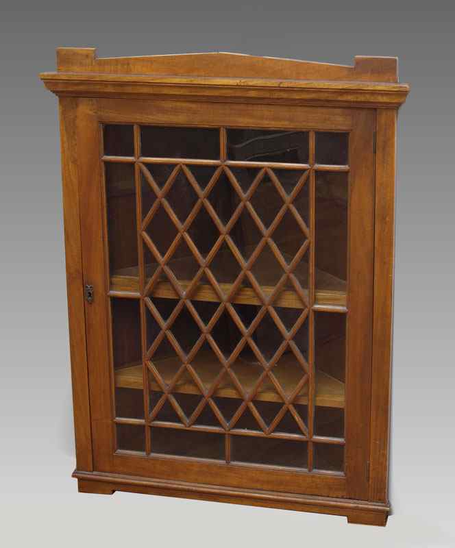 Appraisal: FRETTED WALL HANGING CORNER CABINET internal shelves '' h x