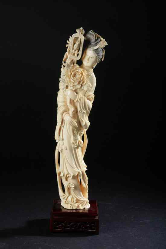 Appraisal: CHINESE IVORY FIGURE OF MEIREN Holding a parrot perched on