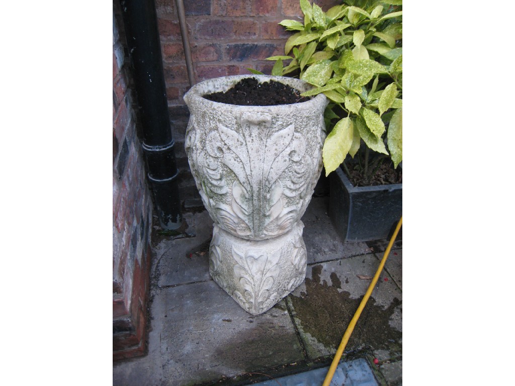 Appraisal: A reproduction composition Planter on stand carved foliage