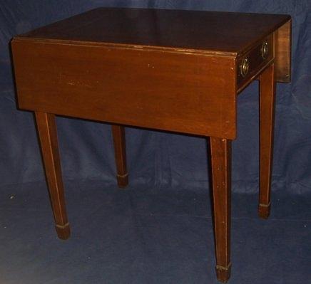 Appraisal: A George III mahogany Pembroke table with two rectangular flaps