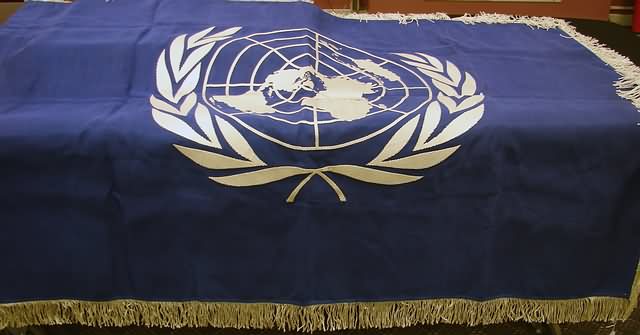 Appraisal: Blue silk flag with white thread embroidery Flag measures x