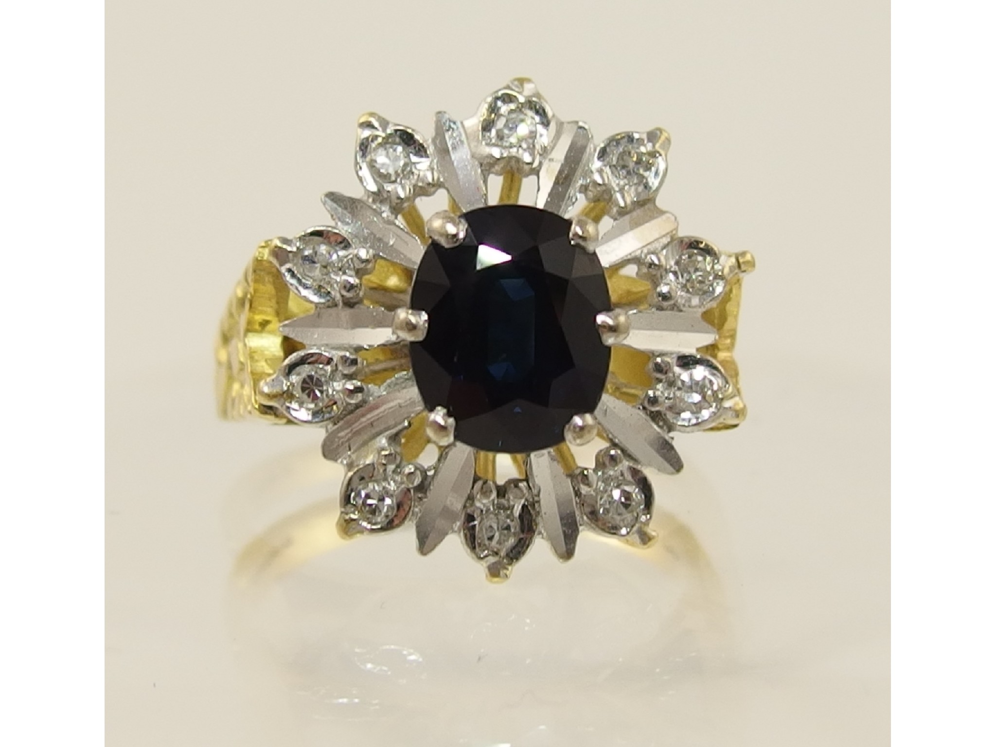 Appraisal: An ct blue gem stone and diamond ring