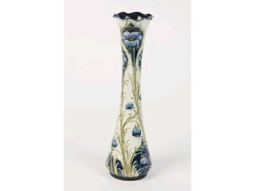 Appraisal: A TALL NARROW FLORIAN WARE VASE with a shaped rim