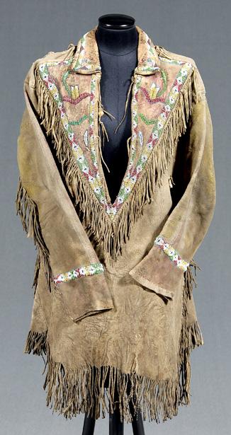 Appraisal: Beaded buckskin shirt buckskin fringe with beaded borders applied bone