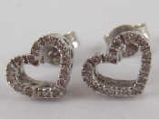 Appraisal: A pair of white metal tests carat gold stud earrings