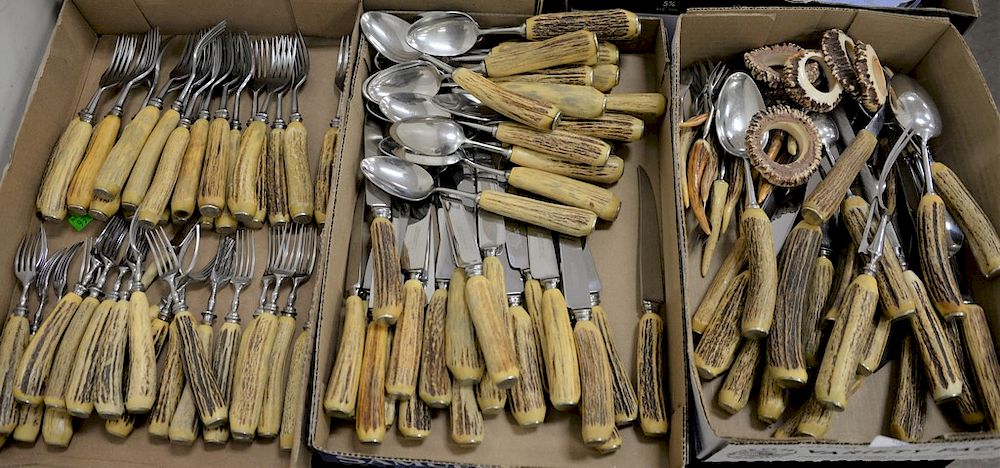 Appraisal: Large antler handle flatware set to include forks spoons and