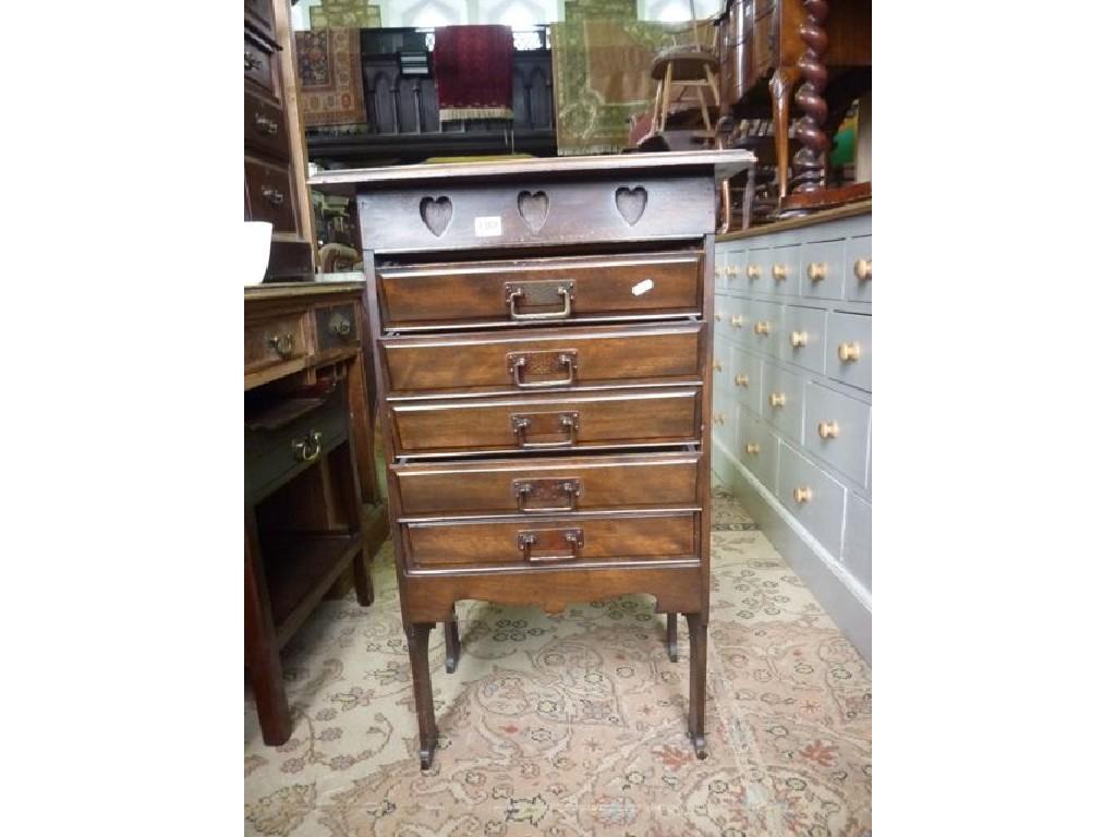 Appraisal: An Arts Crafts style walnut sheet music chest of square