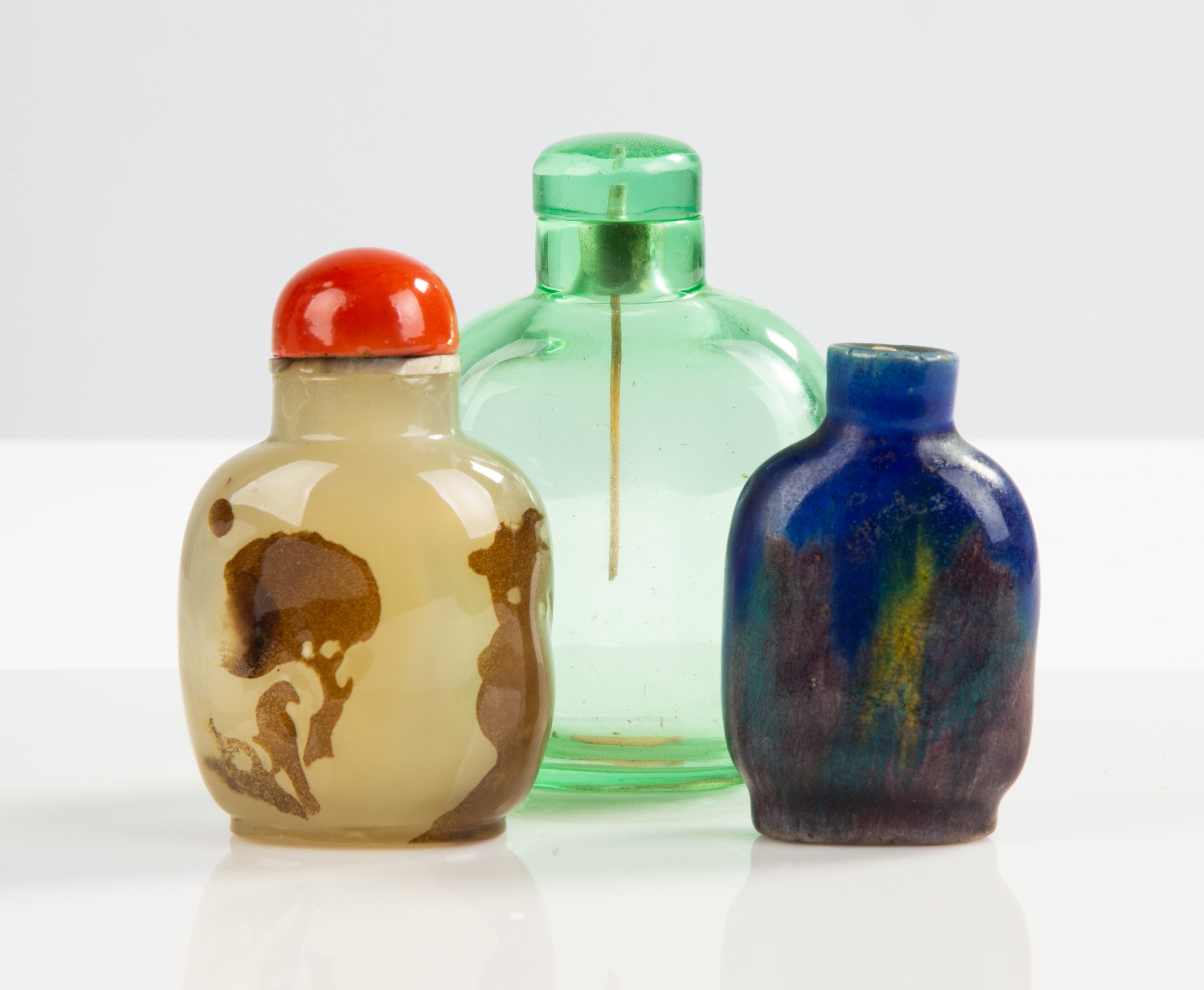 Appraisal: CHINESE HARDSTONE GLASS EARTHENWARE SNUFF BOTTLES Chinese Hardstone Glass Earthenware