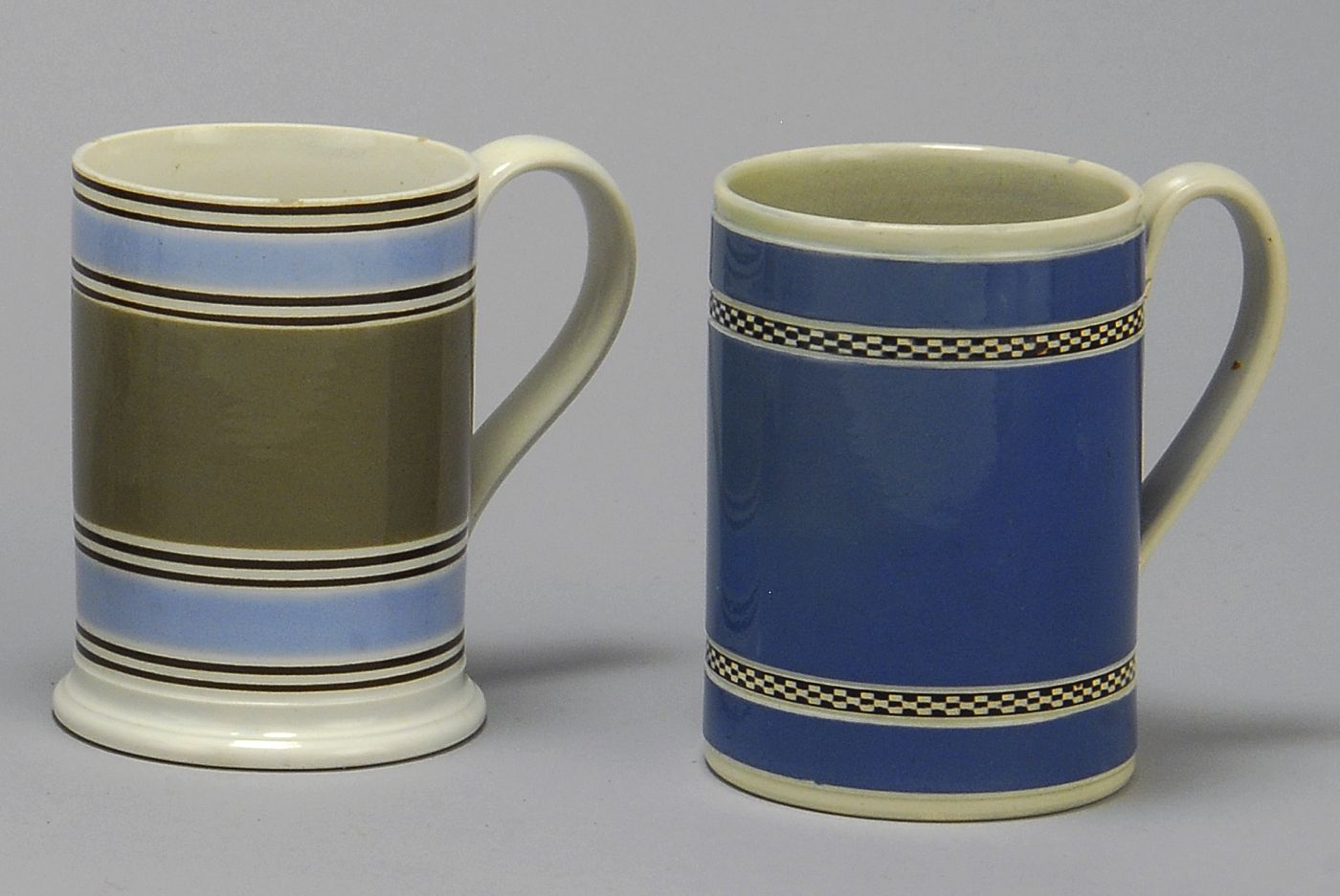 Appraisal: TWO EARLY MOCHA WARE MUGS th CenturyOne sky blue with