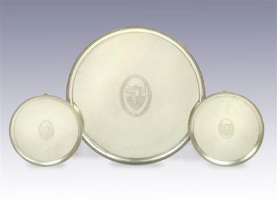 Appraisal: A suite of three George III salvers one large and